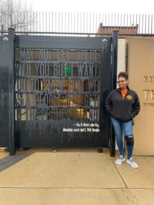 Student standing at the entrance of the National Civil Rights Museum